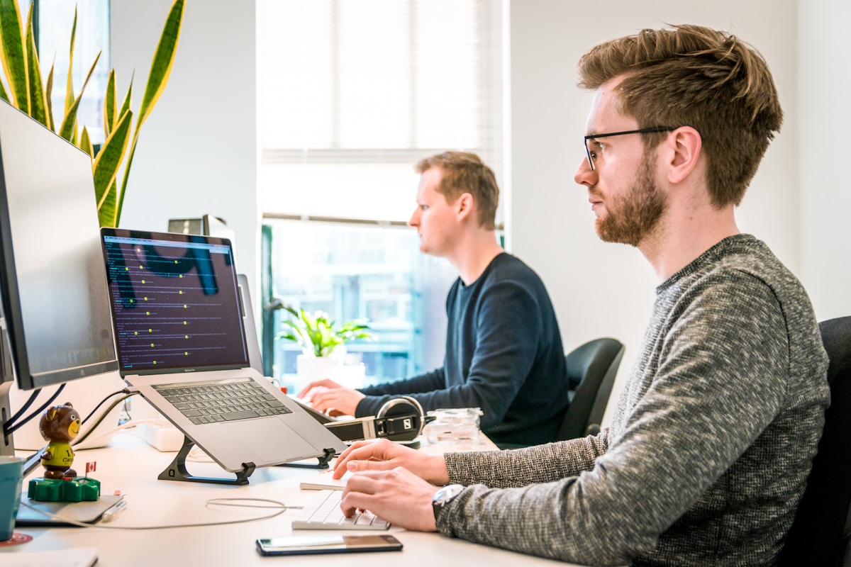 Team evaluating AI software on screens